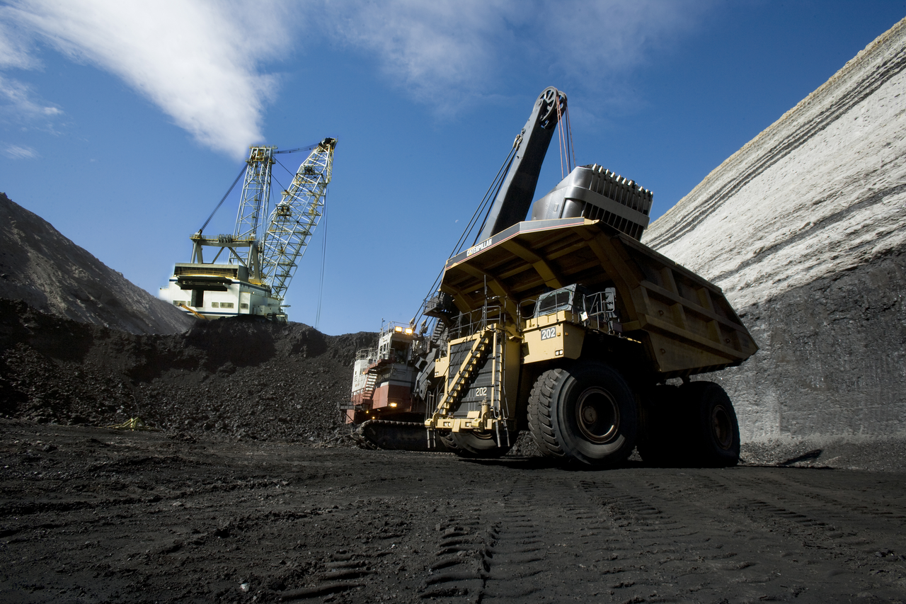 Opencast mining operations with heavy machinery